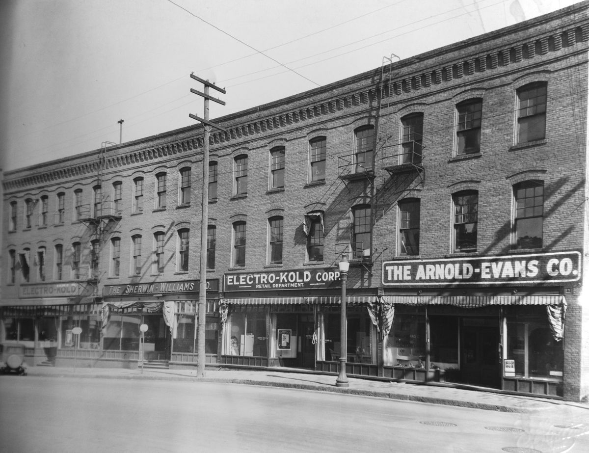 Circa 1930: The Electro-Kold Corporation is shown in two of four commercial bays in the Kirtland Cutter-designed building at 151 and 161 S. Post St., which dates back to 1899 when it was built for a grocery wholesaler, Boothe-Powell Co. After 1906, Beardmore Transfer occupied this space. Electro-Kold moved in during the 1920s and grew to take over the entire building, with shops upstairs and a sales floor below. The company stayed in the building until the 1950s, when it moved to a new building at 303 E. Second Ave. A furniture and gift store, Joel Inc., would move into the space in the 1960s.  (Courtesy of John Matthews)