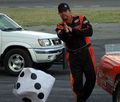 Fast qualifier Gary Lewis tried some body English to give the dice a favorable roll to determine the invert.  It came up a two, for an 8-invert.  (Photo courtesy M.E. Wright) (The Spokesman-Review)
