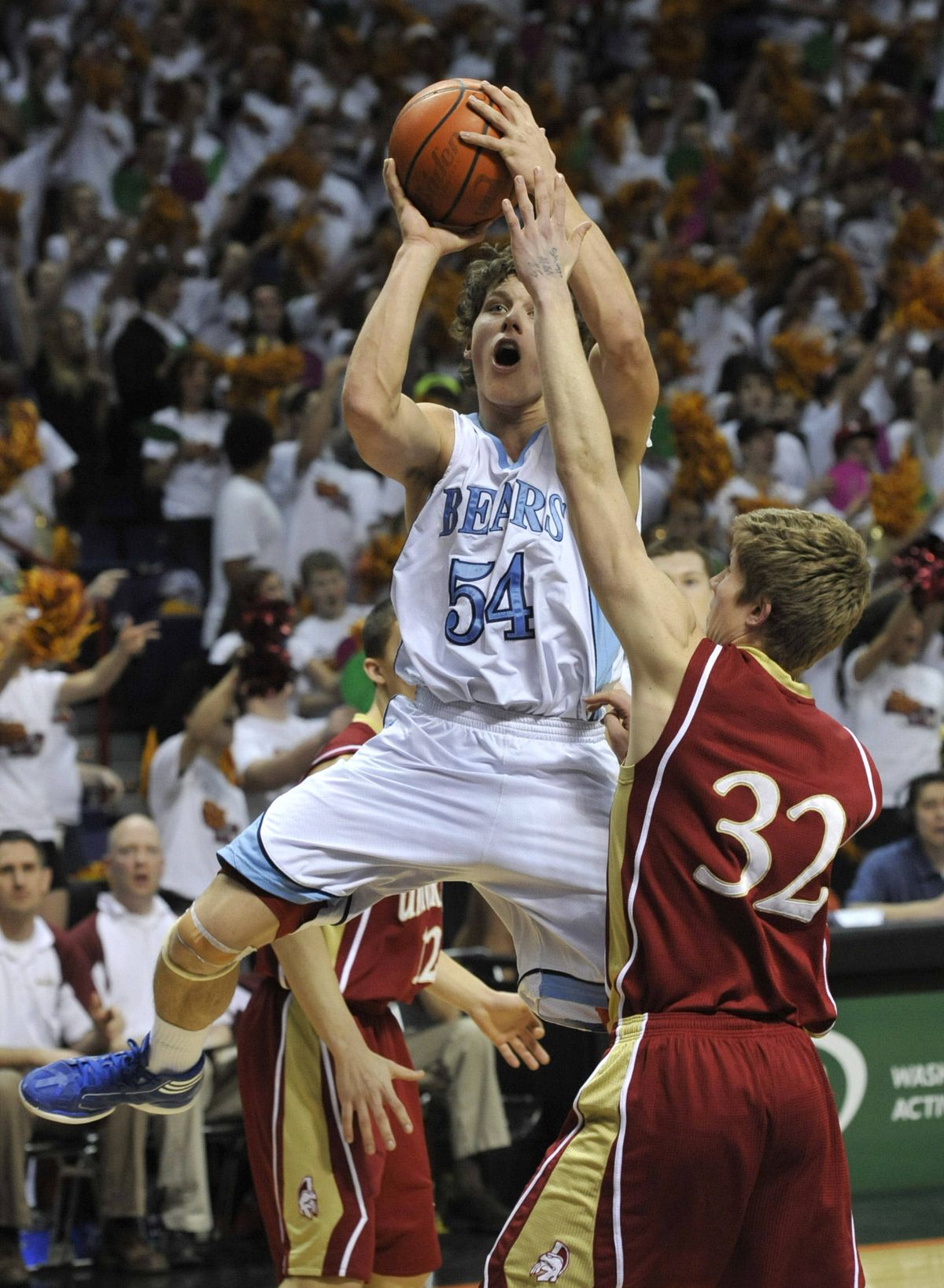 CV’s Gaven Deyarmin shoots over U-Hi’s Zech Martin during the first quarter at the Arena. (Dan Pelle)