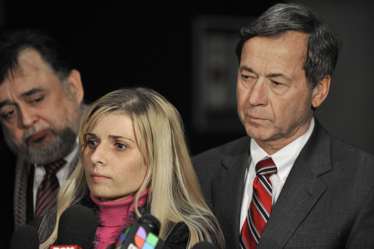 Bartender Karolina Obrycka talks to the media while her attorney, Terry Ekl, right, looks on during a news conference in Chicago on Tuesday. (Associated Press)