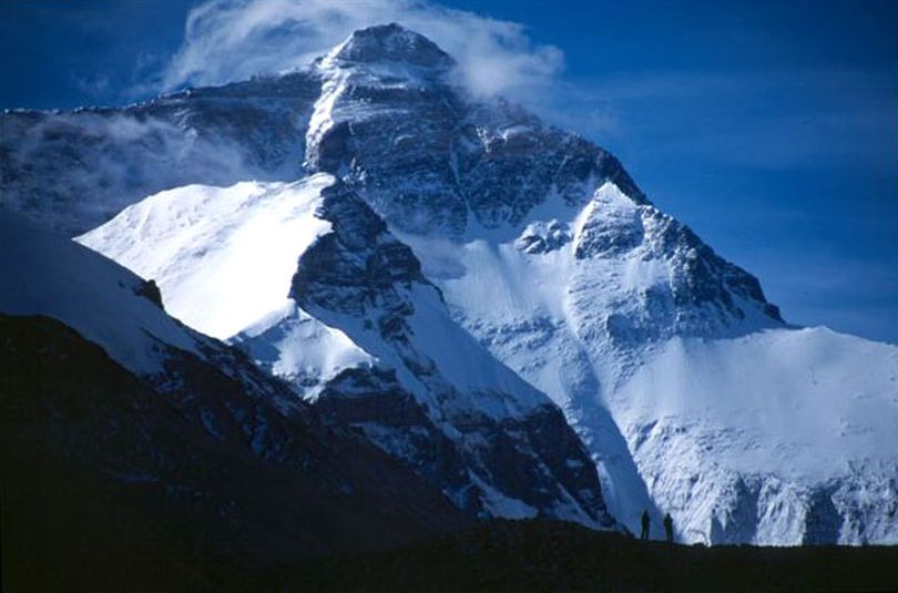 Climbers on the tongue of the Rombuk Glacier looking at the north face Mount Everest.  John and Jess Roskelley climbed the northeast ridge to the left.  Photo copyright by John Roskelley.  (John Roskelley)