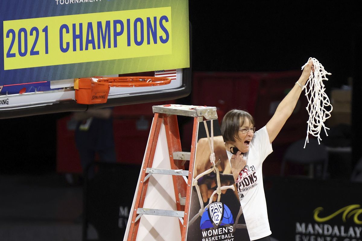 Stanford head coach Tara VanDerveer waves the net after defeating UCLA in the Pac-12 women’s basketball championship March 7 in Las Vegas.  (Isaac Brekken)