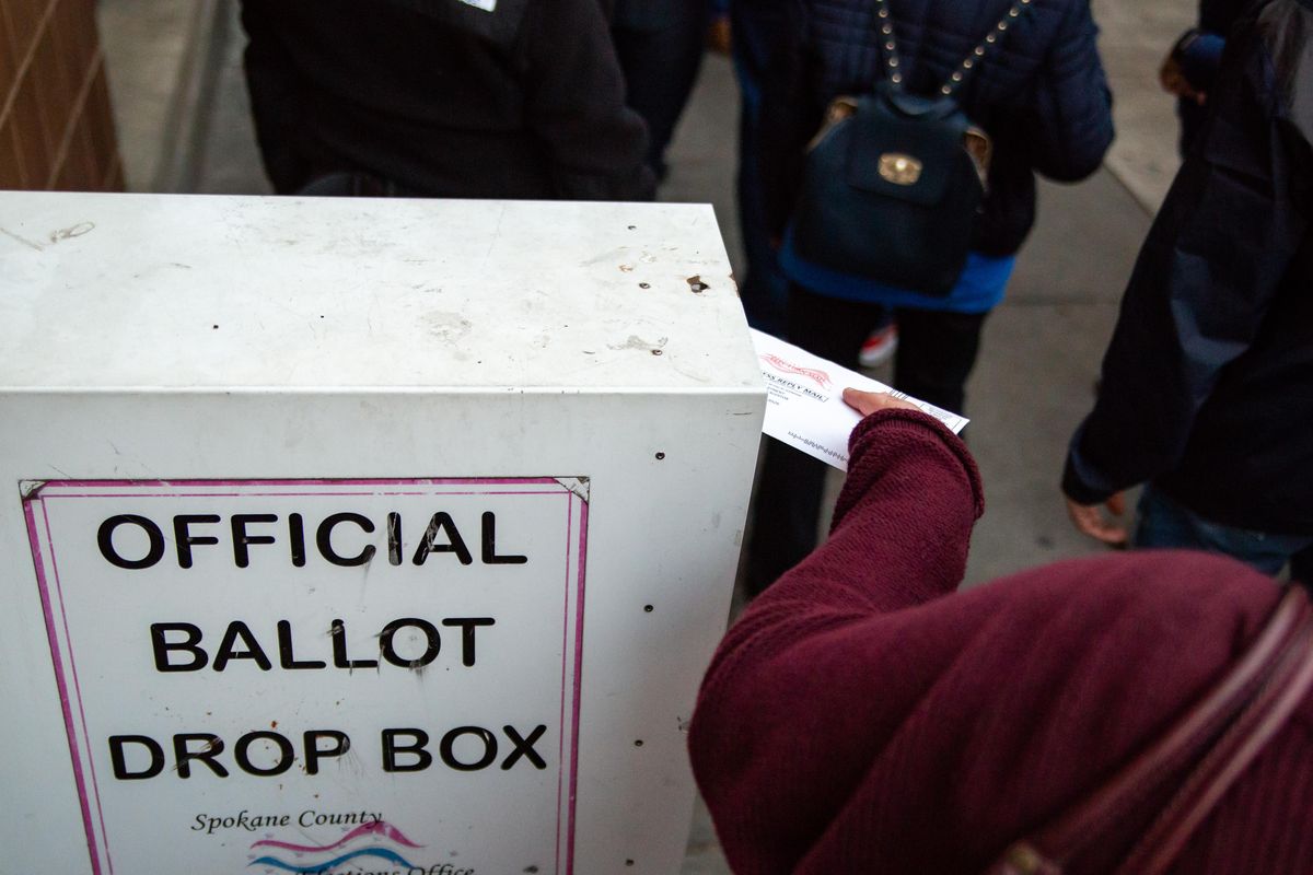 A voter casts her ballot last fall. Today is Election Day in Spokane County. Voters can drop ballots into ballot boxes until 8 p.m. tonight. (Libby Kamrowski / The Spokesman-Review)