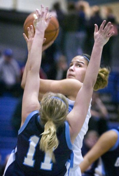 
Central Valley junior Justine Bowman shoots over Gonzaga Prep's Tara Cronin during Tuesday play. 
 (Holly Pickett / The Spokesman-Review)