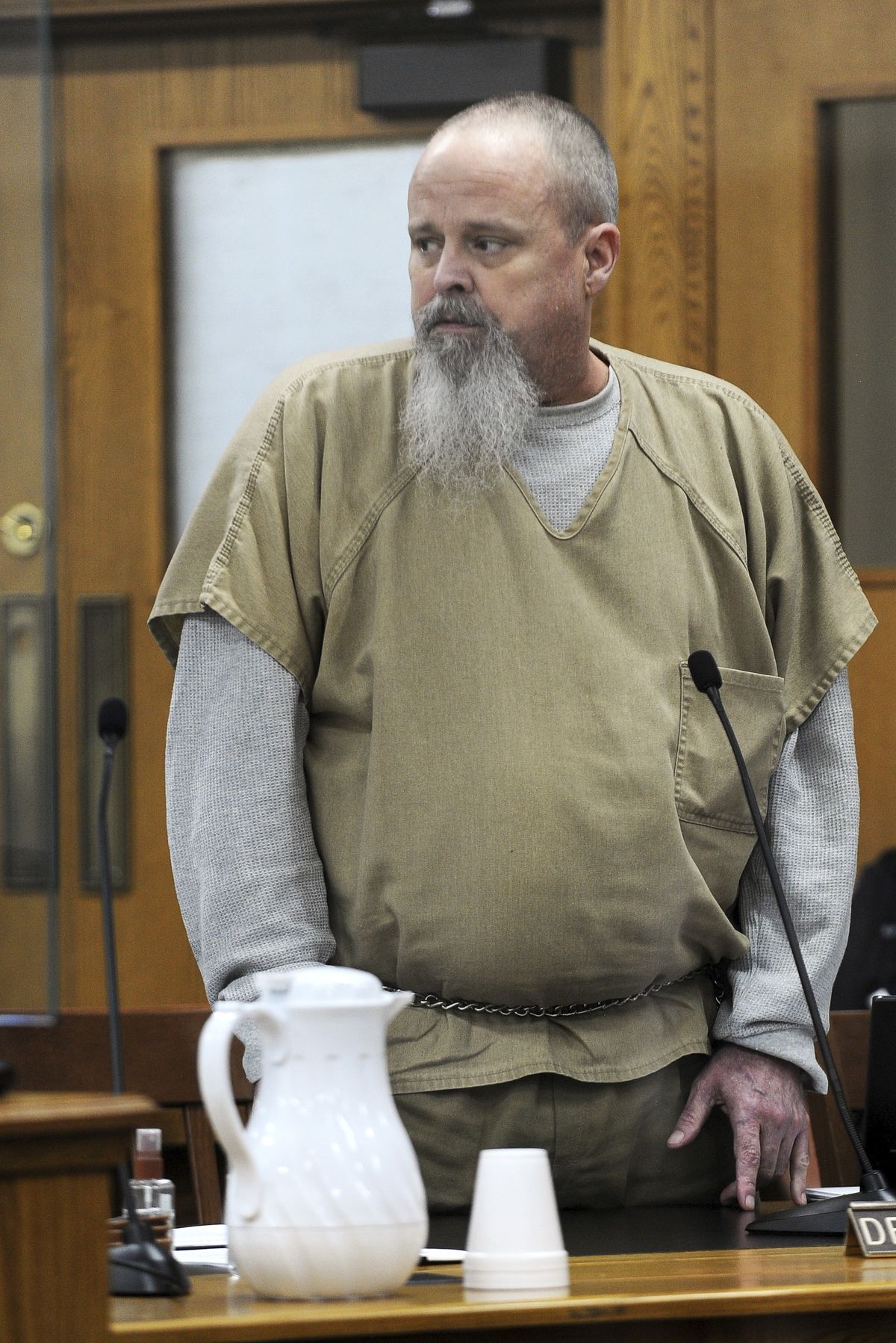 Brian Leigh Dripps Sr. glances over to members of the Dodge family as he makes a statement during his sentencing in Idaho Falls, Idaho on Tuesday, June 8, 2021. Eighteen-year-old Angie Dodge was raped and killed in her Idaho home a quarter-century ago and an innocent man wrongly served 20 years in prison for the crime. On Tuesday, the man authorities say is the real killer was sentenced to life in prison. Fifty-five-year-old Brian Leigh Dripps Sr. must serve at least 20 years in prison before he will be eligible for parole.  (Monte LaOrange)