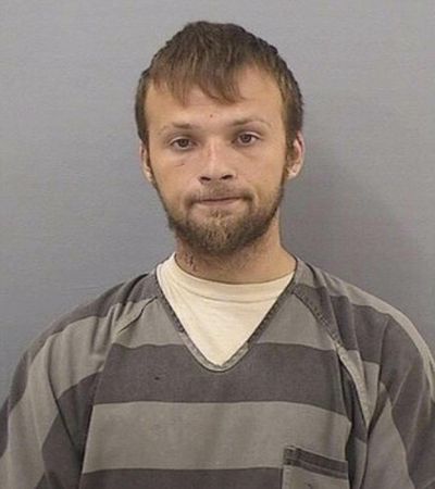 This undated booking photo provided by the Tennessee Bureau of Investigation shows Michael Cummins. Authorities say Cummins, 25, was taken into custody Saturday, April 27, 2019, in the investigation into bodies found in two homes near Westmoreland, Tenn. Authorities say when the suspect Cummins was captured, he produced multiple weapons, prompting an officer to shoot him. Cummins was taken to a local hospital. (Uncredited / AP)