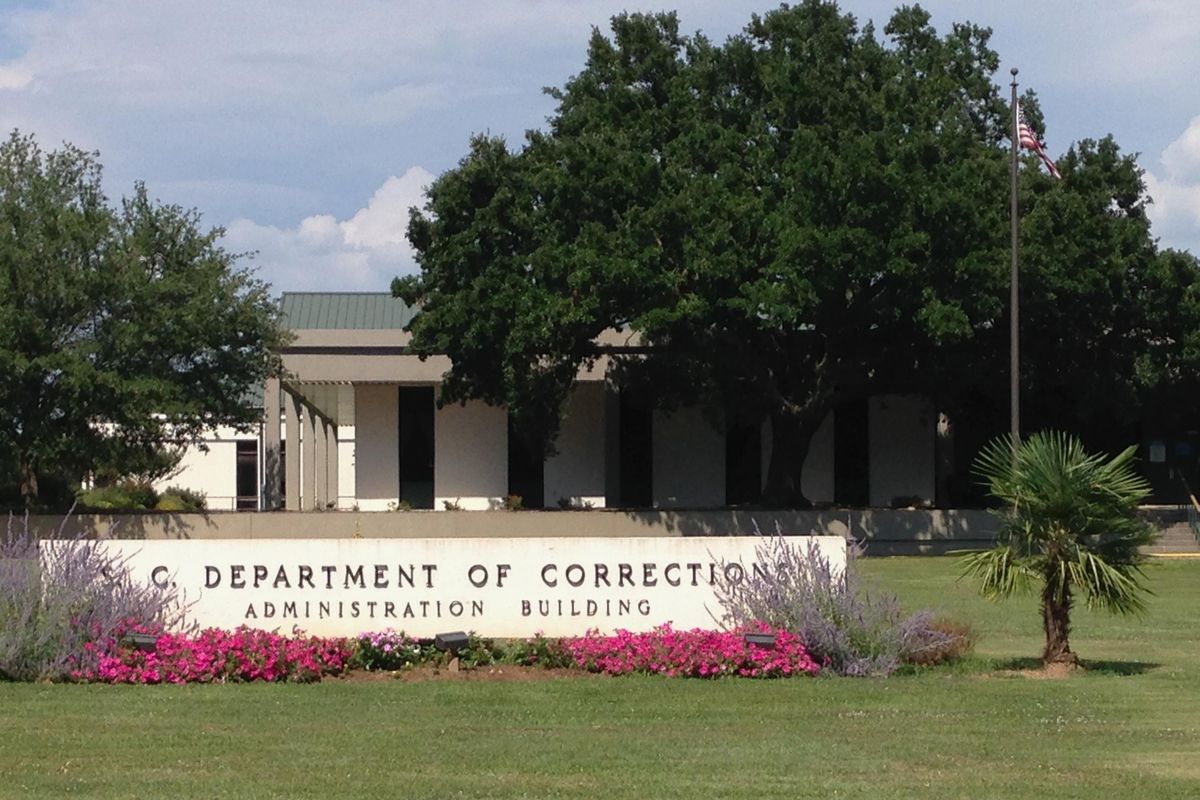 In this June 14, 2017, photo shows the administration building of the South Carolina Department of Correction in Columbia, S.C. A South Carolina inmate says he and another convicted murderer strangled four fellow prisoners in a bid to get the death penalty. (Jeffrey S. Collins / Associated Press)