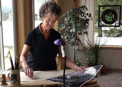 
Dianne Lemley works on a commissioned piece in her Newman Lake studio. 
 (LIZ KISHIMOTO Photos / The Spokesman-Review)