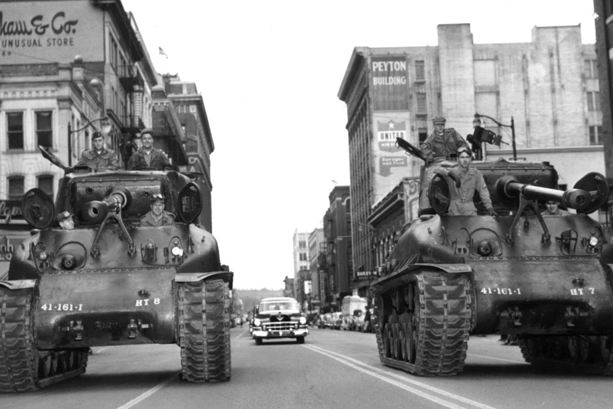 1951: Members of the Washington National Guard’s 161st Infantry drive two M4 Sherman tanks east down Sprague Avenue in Spokane’s 1951 Armistice Day parade. The 161st Infantry had served in the Pacific theater during World War II and later backed up the Army’s 2nd Division in Korea. The roots of the Washington National Guard go all the way back to the Washington Territorial Volunteers in the mid-1850s. After statehood in 1890, the Washington State Guard was formed, but it wasn’t called the “National Guard” until World War I. The National Defense Act of 1933 described the Guard force as a backup to the regular military.  (THE SPOKESMAN-REVIEW PHOTO ARCHIVE)