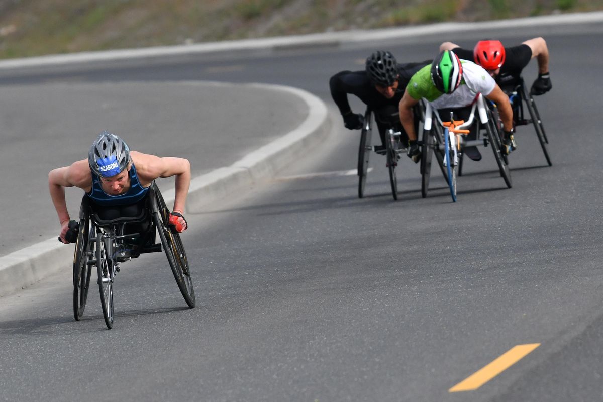 Susannah Scaroni leads the chase pack during Bloomsday 2019 on Sunday, May 5, 2019 in Spokane, Wash. Scaroni won the women’s elite wheelchair division in a course-record time of 29:58. (Tyler Tjomsland / The Spokesman-Review)