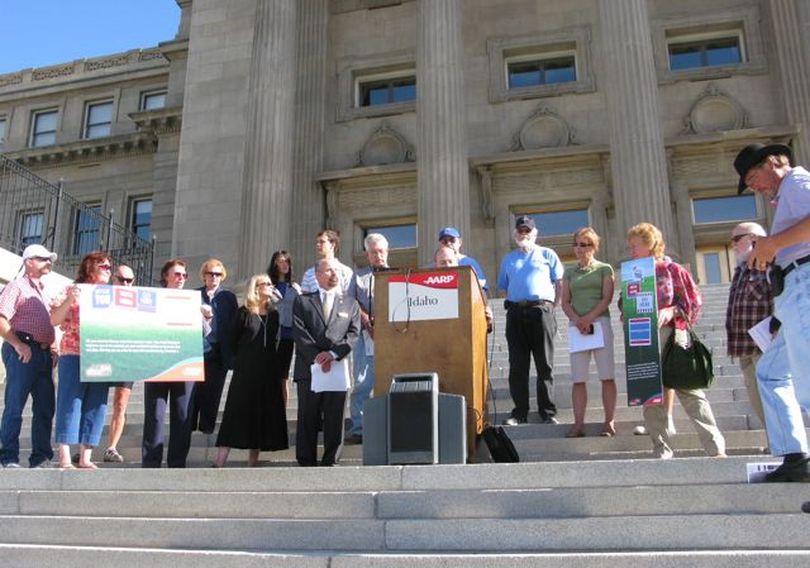 AARP officials and volunteers gather on the Idaho state capitol steps to launch an unprecedented statewide voter education campaign aimed at this year's state and legislative races. (Betsy Russell)