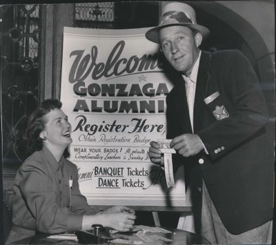Bing Crosby registers for Gonzaga University alumni event with Gonzaga’s Homecoming Queen Joyce Greiser in May 1951.  (Spokesman-Review archives)