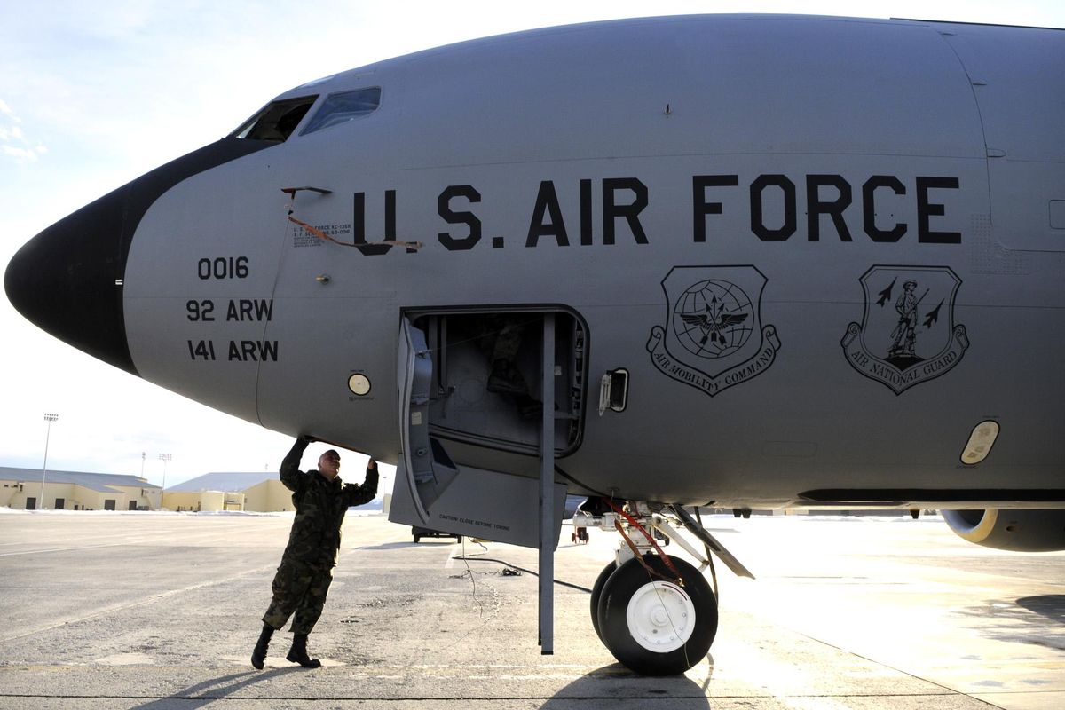 Tech. Sgt. David Carney checks a 50-year-old KC-135 parked on the flightline at Fairchild Air Force Base, February 29, 2008. (Dan Pelle / The Spokesman-Review)