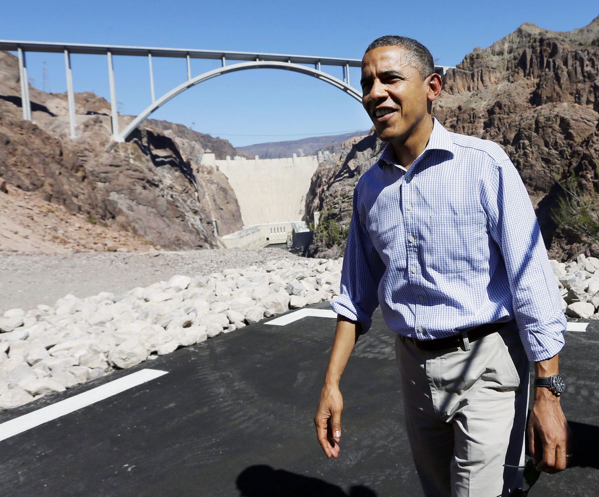 President Barack Obama stands at the heliport overlooking the Hoover Dam, Tuesday, Oct. 2, 2012 in Boulder City, Nev. (Pablo Monsivais / Associated Press)