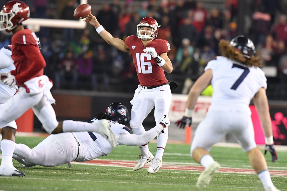 Washington State Cougars quarterback Gardner Minshew (16) throws under pressure against Arizona during the first half of a college football game on Saturday, November 17, 2018, at Martin Stadium in Pullman, Wash. (Tyler Tjomsland / The Spokesman-Review)