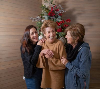 Molly Allen, Ellen Travolta and Margaret Travolta laugh before posing for a portrait on Nov. 19, 2018, in the Coeur d’Alene Resort. Ellen Travolta has said this year will be the last she appears in the resort’s Christmas show.  (Libby Kamrowski)