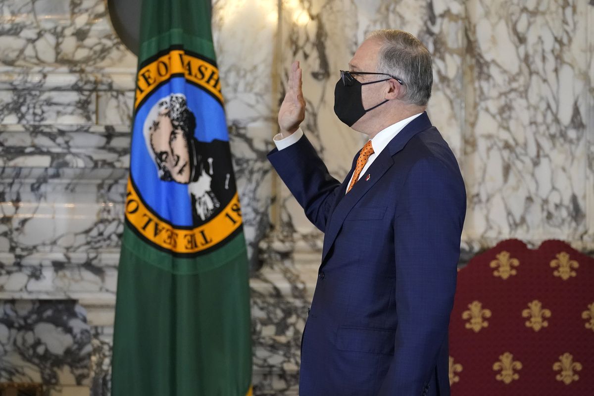 Washington Gov. Jay Inslee takes the oath of office for his third term as governor  (Associated Press)