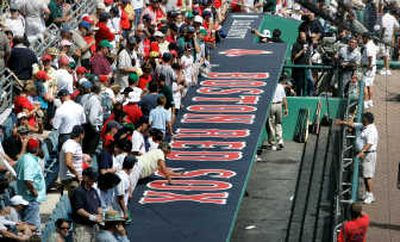 
The Boston Red Sox dugout remained empty at the scheduled start time of Wednesday's game.Associated Press
 (Associated Press / The Spokesman-Review)