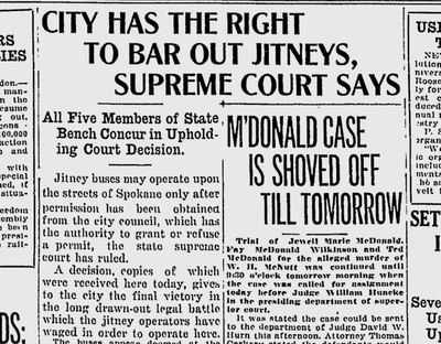 Jitneys were small vans or buses, privately owned, which picked up paying passengers on set routes. (Spokane Daily Chronicle archives)