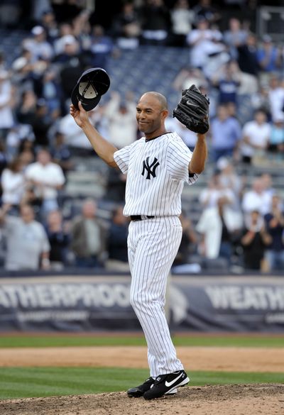Mariano Rivera salutes the crowd after recording his MLB-record 602nd save. (Associated Press)