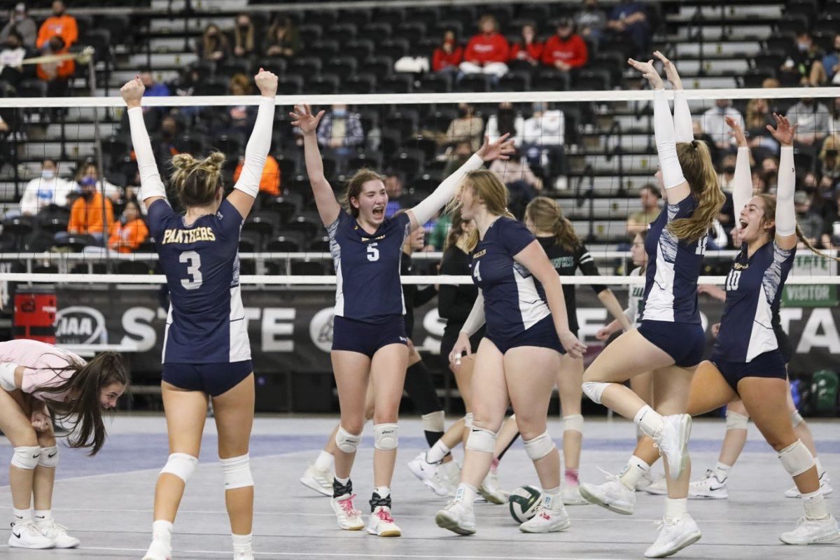 Cassie Moeller (5) leads the celebration for a first-set point during Mead’s State 3A title win Friday in Yakima.  (Cheryl Nichols/For The Spokesman-Review)