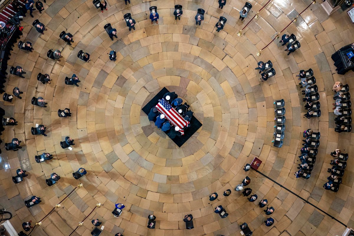 The casket of former Sen. Harry Reid, D-Nev., arrives in the Rotunda of the U.S. Capitol, where he lie in state on Wednesday in Washington.  (Andrew Harnik/Associated Press)
