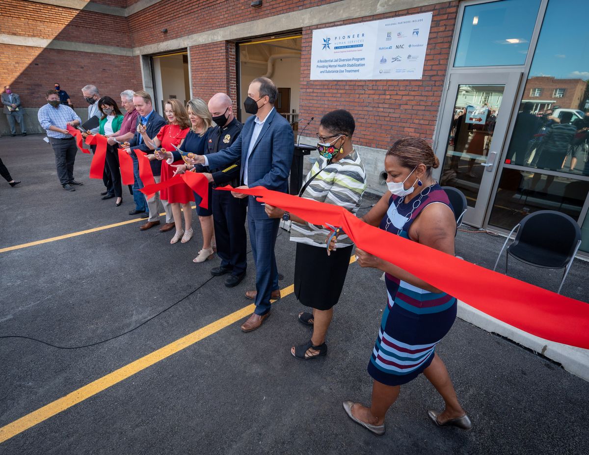Community leaders cut the ribbon on the new Spokane Regional Stabilization Center run by Pioneer Health Service on Monday.  (COLIN MULVANY/THE SPOKESMAN-REVIEW)