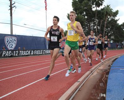 Washington State’s Paul Ryan, left, broke the 4-minute-mile mark during the 2018-19 indoor season at the MPSF Championships.  (Courtesy of Pac-12)