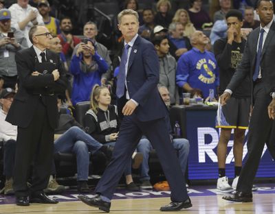 Golden State Warriors head coach Steve Kerr walks off the court after being ejected by referee Bill Spooner during the third quarter of an NBA basketball game against the Sacramento Kings, Saturday, Feb. 4, 2017, in Sacramento, Calif. (Rich Pedroncelli / Associated Press)