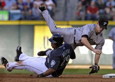
Adrian Beltre upends Blue Jays second baseman Aaron Hill after Beltre is forced at second while breaking up a double-play attempt. Associated Press
 (Associated Press / The Spokesman-Review)
