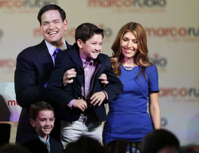Florida Sen. Marco Rubio holds up his son Anthony after having announced that he will be running for the Republican presidential nomination. (Associated Press)