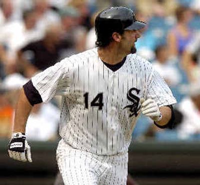 
Chicago's Paul Konerko watches his two-run home run fly out of the park during the third inning against the Mariners. 
 (Associated Press / The Spokesman-Review)