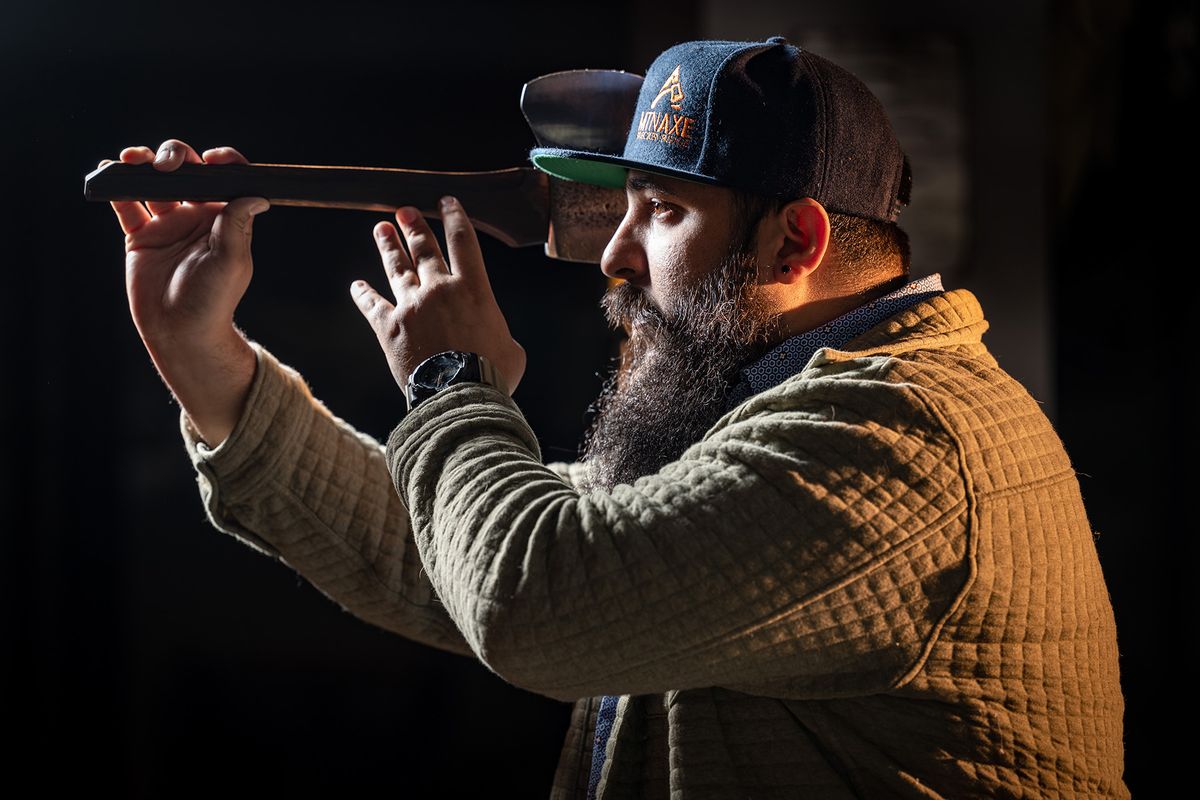 Miguel Tamburini, owner of Jumping Jackalope Axe Throwing on Riverside Avenue, has been the No. 1-rated axe thrower in the world. His new shop has reopened, and he’s bringing an axe-throwing competition to Spokane in May.  (COLIN MULVANY/THE SPOKESMAN-REVIEW)