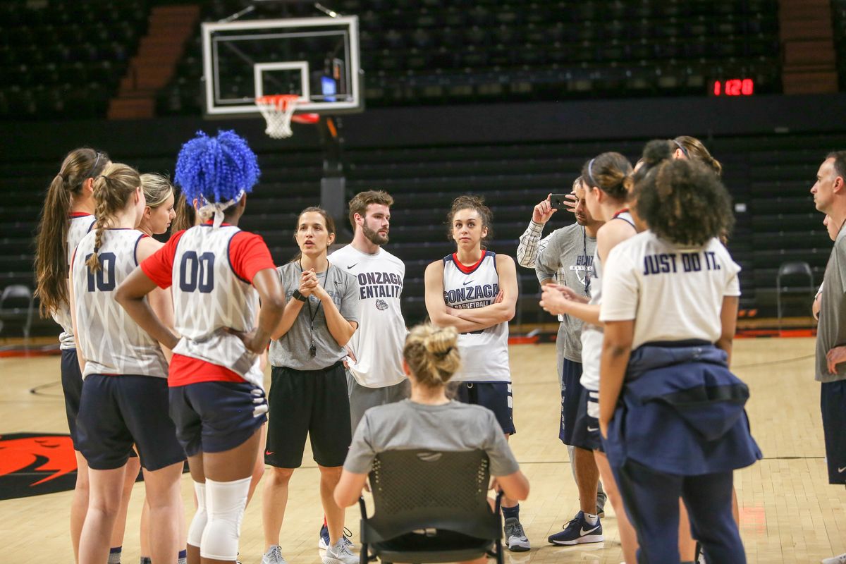 Gonzaga women’s basketball coach Lisa Fortier, center facing, gives instructions to her team during a practice on Friday  in Corvallis, Oregon. (Mike Wootton / Courtesy)