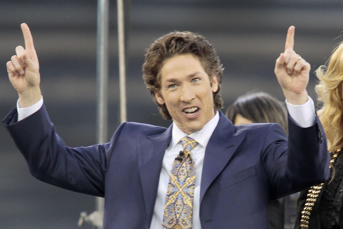 This April 24, 2010 file photo shows Lakewood Church pastor Joel Osteen at Dodger Stadium during his "A Night of Hope" in Los Angeles. (Richard Vogel / Associated Press)