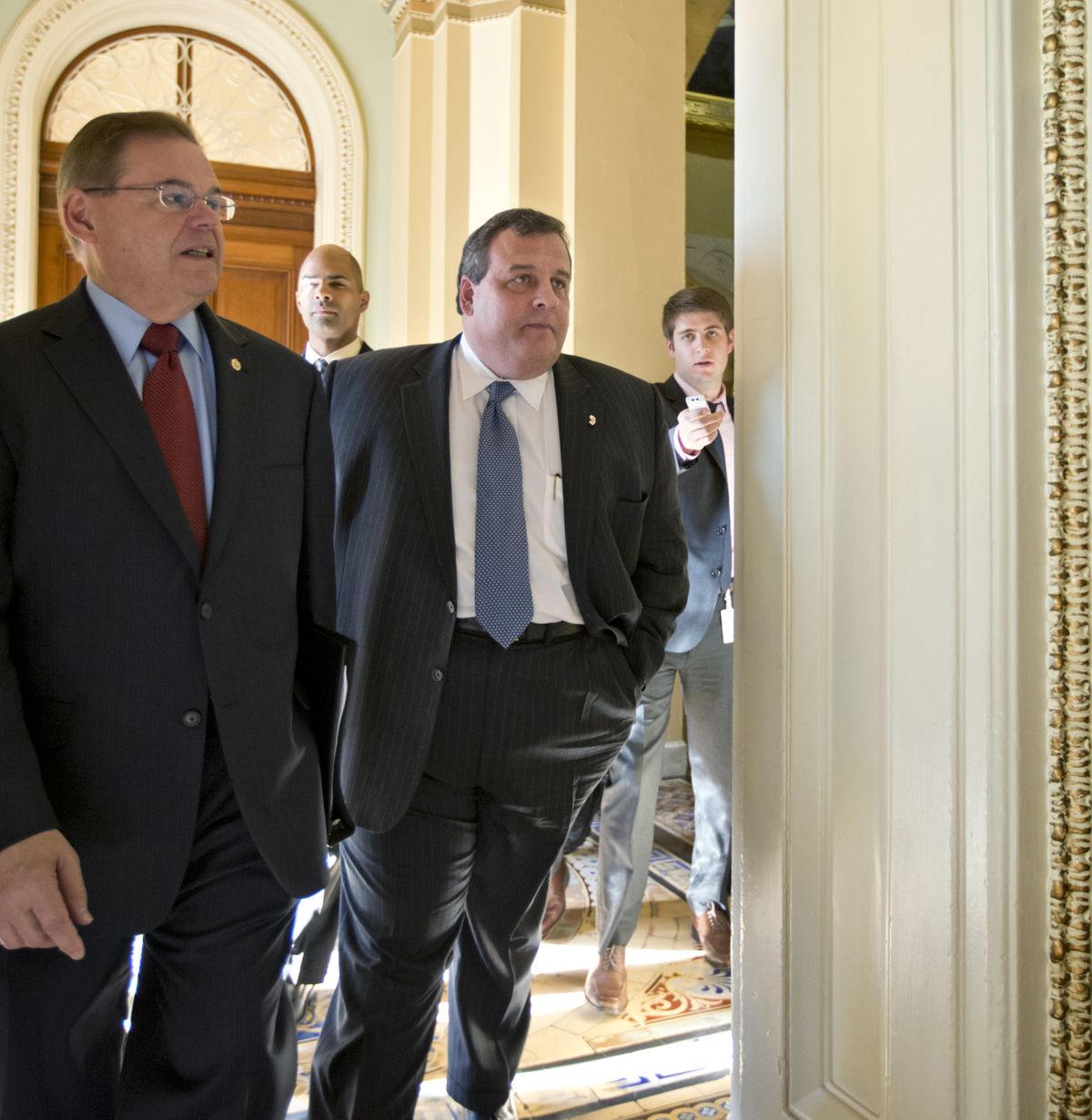 New Jersey Gov. Chris Christie, center, walks to a meeting on Capitol Hill on Thursday.