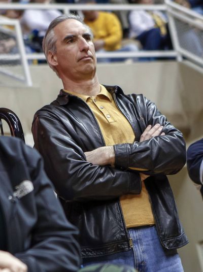 West Virginia’s Oliver Luck guards against giving his opinion on playoff. (Associated Press)