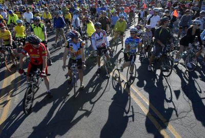 Cyclists wait for the start of the first annual SpokeFest at the Flour Mill on Sunday morning. The 21-mile community bike ride  traveled along the Centennial Trail and through Riverside State Park, finishing at the Spokane Falls.   (J. BART RAYNIAK / The Spokesman-Review)