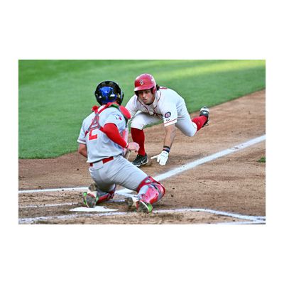 Vancouver Canadians catcher Jacob Lojewski waits with the ball as Spokane Indians third base Blake Wright readies to slide into home on Wednesday, Aug. 13, 2025 at Avista Stadium. The Indians lost 8-6.  (James Snook/Spokane Indians)