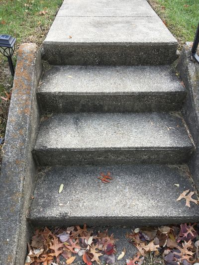 These cast concrete steps are very likely more than 100 years old and in nearly perfect condition. The clue to their age is the presence of the sidewalls.  (Tribune Content Agency)