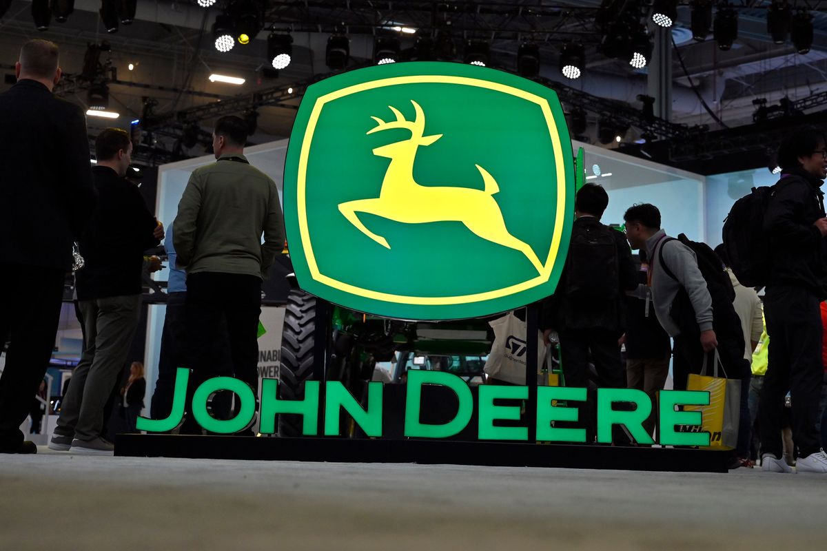 John Deere booth signage is displayed at CES 2023 at the Las Vegas Convention Center on Jan. 6, 2023, in Las Vegas.  (Tribune News Service )