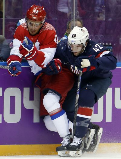 Center David Backes, right, has become a proven playmaker for Team USA during the Olympics. (Associated Press)