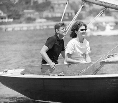 In this Aug. 7, 1960,  photo, Sen. John F. Kennedy and his wife, Jacqueline, sail in the family sailboat, Victura, off the Cape Cod shore at Hyannis, Mass. The John F. Kennedy Library Foundation announced Wednesday, March 15, 2017, it was launching a campaign to preserve the aging sailboat, which it displays on the library lawn during the summer months. (Associated Press)