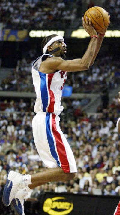 
Detroit Pistons guard Richard Hamilton puts in two of his 31 points in leading the Pistons over the Lakers in Game 3 of the NBA Finals. 
 (Associated Press / The Spokesman-Review)
