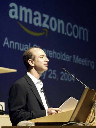 
Jeff Bezos, president, chief executive officer and chairman of the board of Amazon.com, speaks at the annual shareholders meeting Tuesday in Seattle. Jeff Bezos, president, chief executive officer and chairman of the board of Amazon.com, speaks at the annual shareholders meeting Tuesday in Seattle. 
 (Associated PressAssociated Press / The Spokesman-Review)