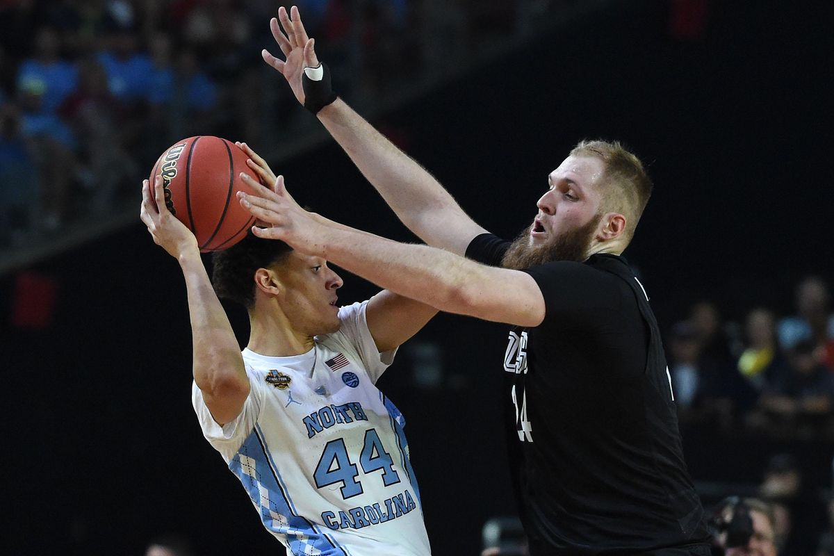 Gonzaga center Przemek Karnowski defends North Carolina’s Justin Jackson in the first half of the national championship game on Monday, April 3, in Glendale, Arizona. (Colin Mulvany / The Spokesman-Review)