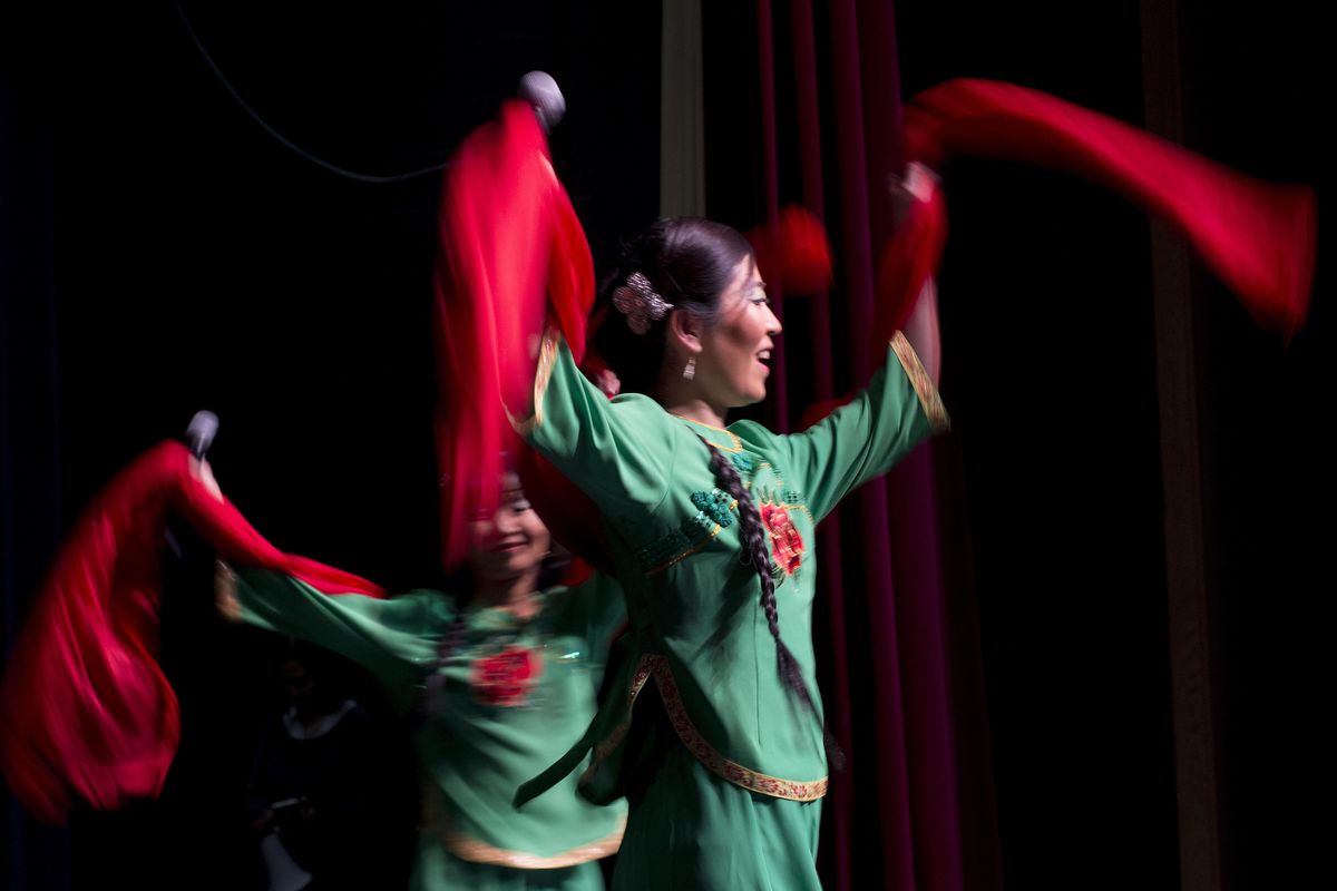 Susan Butler, right, performs with Xue Min during a rehearsal for the Spokane Chinese Association