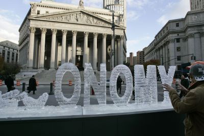 The word “economy” melts in an ice sculpture titled “Main Street Meltdown”   in New York on Wednesday.  (Associated Press / The Spokesman-Review)