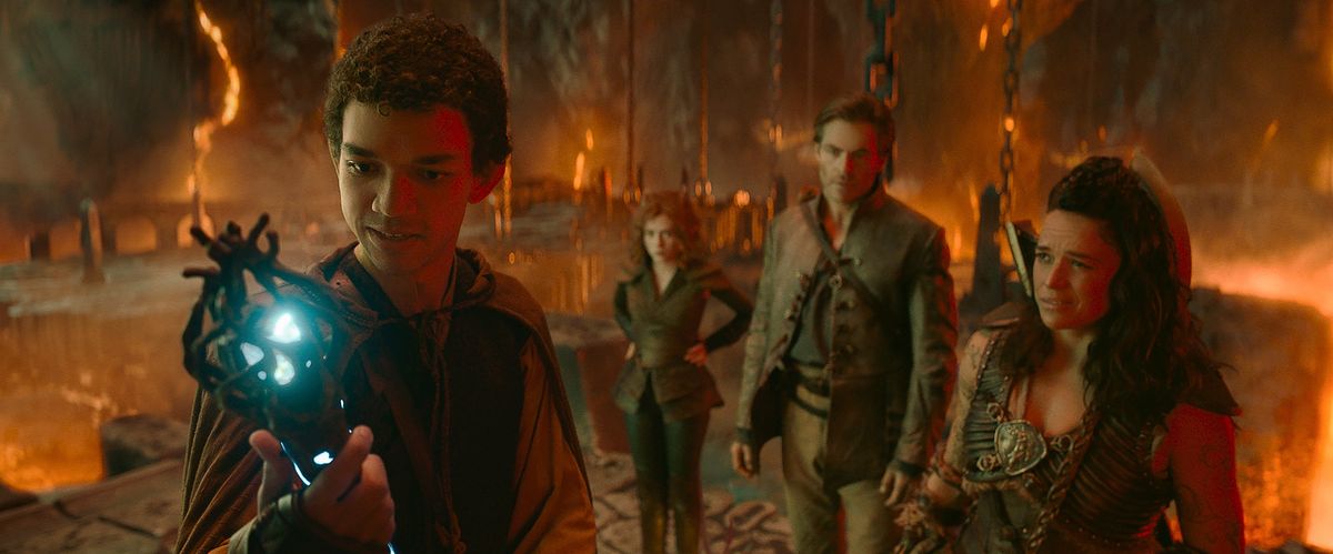 Justice Smith, left, as Simon, Sophia Lillis as Doric, Chris Pine as Edgin and Michelle Rodriguez as Holga in “Dungeons & Dragons: Honor Among Thieves.”  (Paramount Pictures and eOne)