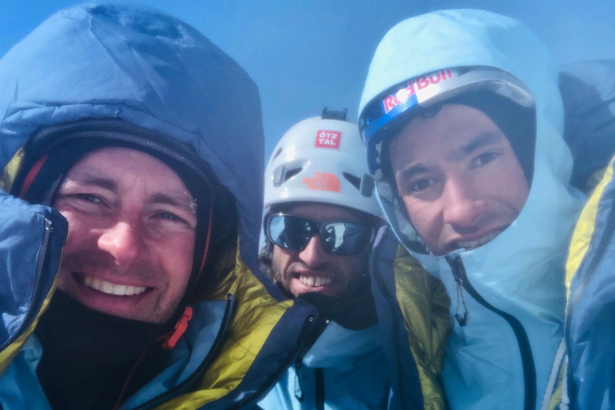 Jess Roskelley, left, snaps a selfie with Hansjörg Auer and David Lama on the summit of Howse Peak, April 16, 2019. All three alpinists were killed in an avalanche on the descent.  (Courtesy of Roskelley family)